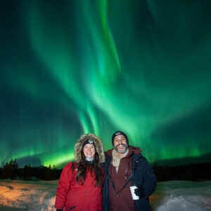 People under the aurora in Whitehorse